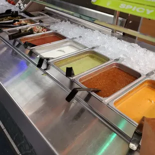 Superb, diverse salsa and pickled veggie bar