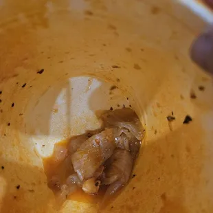 Cooked onion left in taking space in the container.