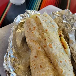 two burritos and a drink