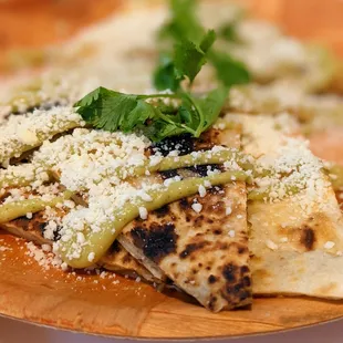 Kimchi Quesadilla. $8. Flour tortilla, Chihuahua cheese and queso fresco, avocado sauce.