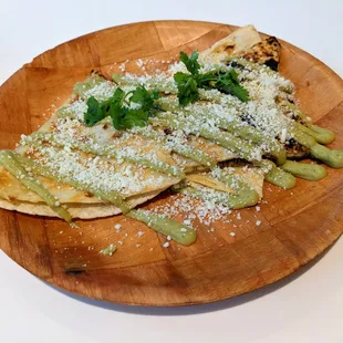 Kimchi Quesadilla. $8. Flour tortilla, Chihuahua cheese and queso fresco, avocado sauce.