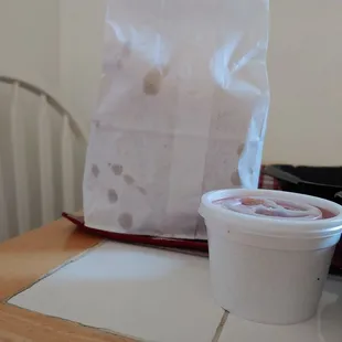 a plastic container of yogurt