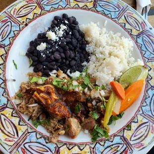 Carnitas plate: braised pork with rice and beans.  Served with tortillas.