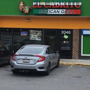 two cars parked outside