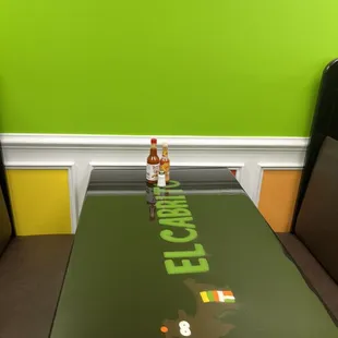 a bottle of el cabrito on a table