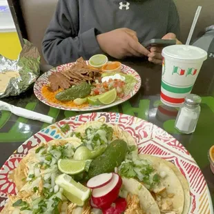 5 Tacos + beans and rice for $11