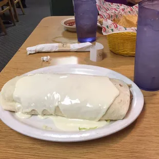 a burrito and a glass of water