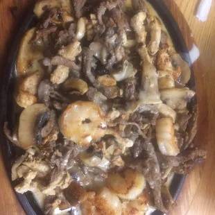 They made the order  I fajita beef chicken shrimp mushrooms topping queso was fantastic