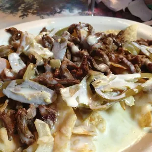 Great Authentic Mexican food. Although not on menu they will make Carne Asada nachos.