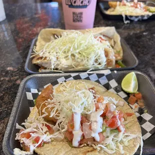 Front: Taco Ensenada Pescado Back: Grilled Tilapia Taco  Strawberry milk agua Fresca