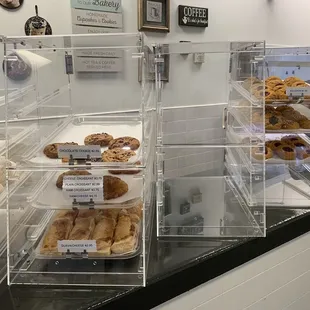 a counter with a variety of pastries