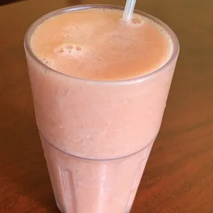 a smoothie in a plastic cup