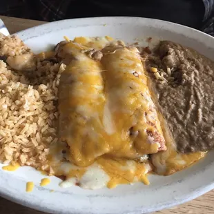 My brothers two beef enchiladas,  it was devoured lol