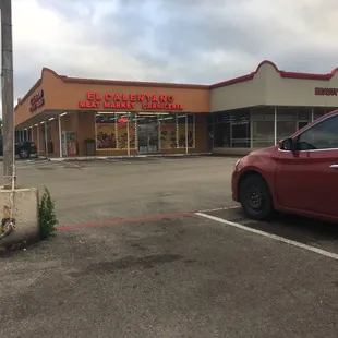 a car parked in a parking lot