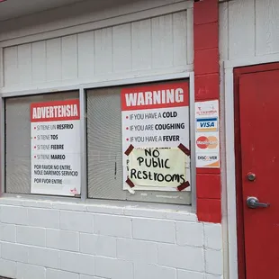 a red door and windows