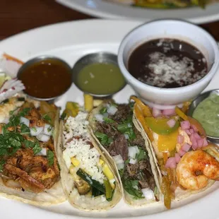 Al pastor, calabacita, barbacoa, shrimp tacos