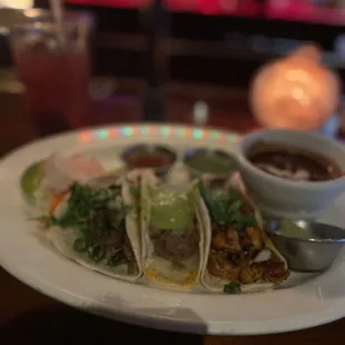 Create your own tacos, lechon, barbacoa, and Al pastor with sangria