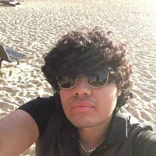 Luis E.