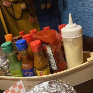 Every sauce you could ever want- bonus points for the adorable boat