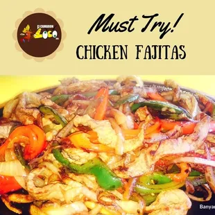 Chicken Fajitas --- a skillet with sliced red and green bell peppers and onions.