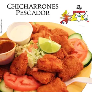 Our Chicharrones Pescador are homemade breaded fish nuggets with cucumber and tomato.