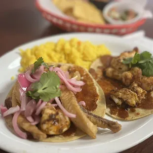 Fish and shrimp tacos. Just a little spicy. Delicious.