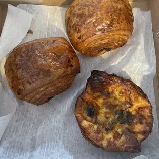 three pastries in a box
