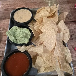 queso guac salsa and chips