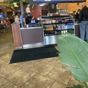 Found this cashier a bit more interested in counting the cash drawer than selling me tacos.