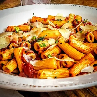 Penne pasta tossed in marinara sauce, topped with shaved imported parmesan cheese and parsley.