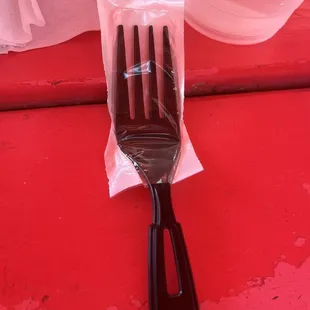 Plastic covered utensils! Perfect for this type of venu