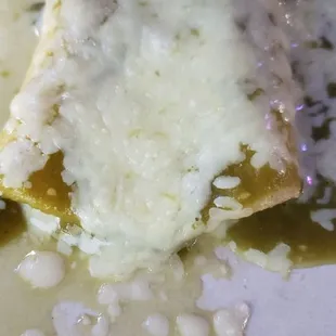 One cheese enchilada with verde sauce