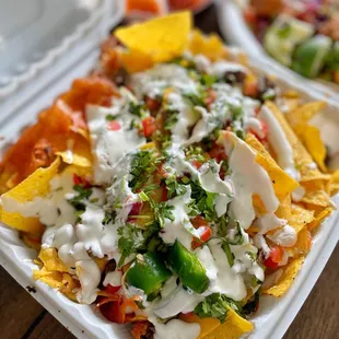 nachos in a styrofoam container