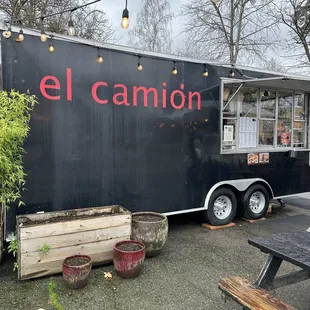 a food truck parked in a parking lot