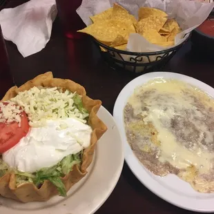 Chips and salsa, Chile relleno, taco salad with ground beef and no guac