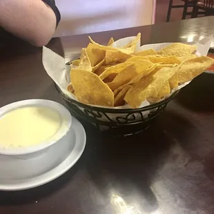 Chips with salsa and queso dip