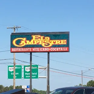 the sign for el campestre