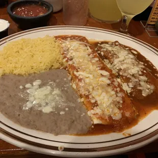 Vegetarian #1, burrito, enchilada, and rice/beans   Sour cream was an extra $1.25