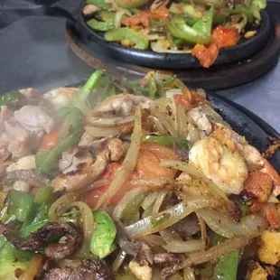 Combo fajita skillets made with steak, chicken and shrimp.