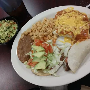 Mexican plate with a side of guacamole. Guac was so-so.