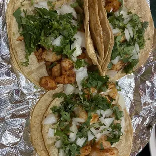 three tacos on a plate