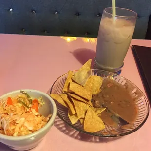 This is what you get while you wait. Chips with beans &amp; curtido.