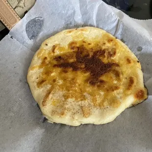 Pork and cheese papusa