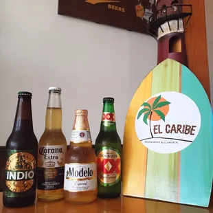 a variety of beer bottles on a table