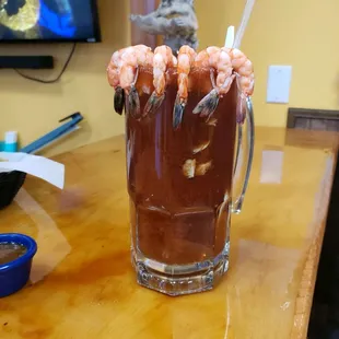 a glass of shrimp cocktail