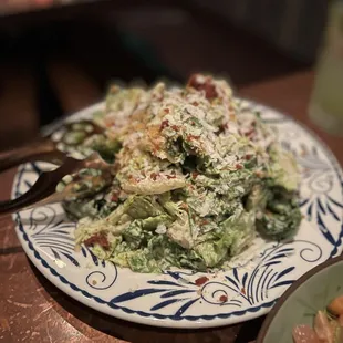 Caesar salad. We didn't order this, but it was a gift for us to try bc of our anniversary. Easily the best Caesar  salad I have ever had!