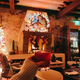 a person holding a glass of wine