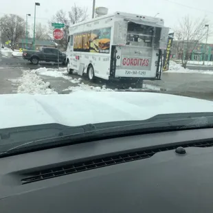 a food truck in a parking lot