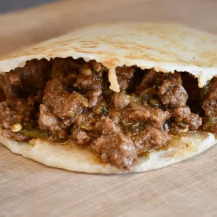 a close up of a burrito