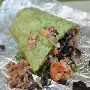Prawn burrito on a spinach tortilla